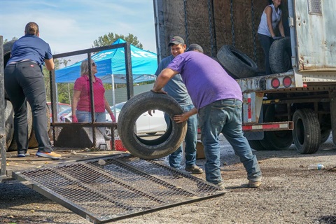 Scrap tires are collected during the Tire Blitz