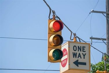 A traffic signal without a backplate on a span wire